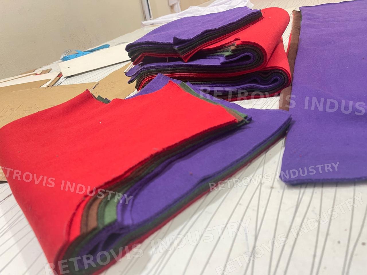 Layered fabric being cut